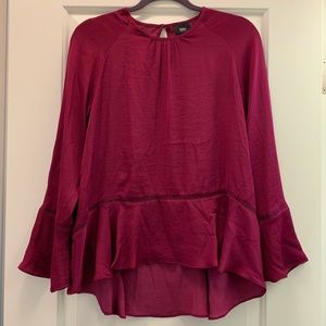High-low bell-sleeved tunic in Cranberry.